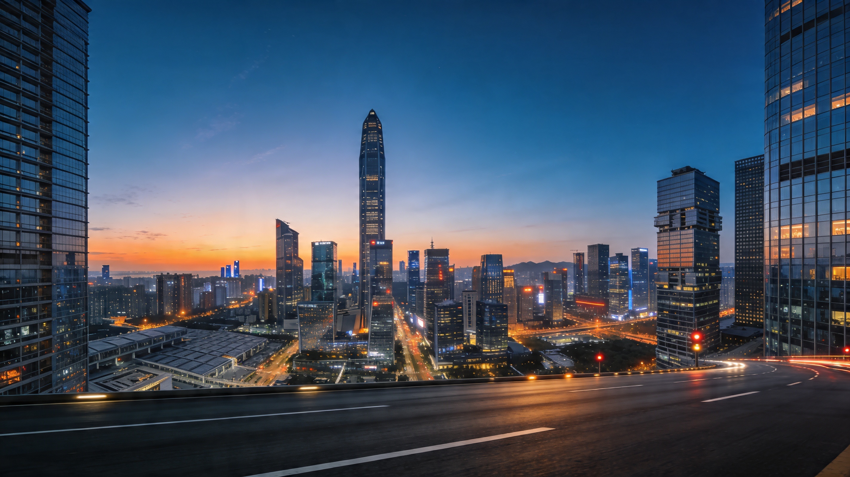 Shenzhen city skyline at dusk, with a multilane road and high-rise buildings in the foreground.